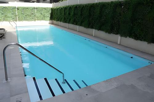 Cama Premium Piscina Terraza Parrilla Security 24 7 WiFi 3PAX PRAT 211 — 4-Star Luxury Hotel in Santiago, Chile