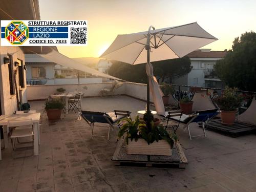 Attico TerraMare Beach & Maxi Terrace & ElectricBBQ — 4-Star Luxury Hotel in Santa Marinella, Italy