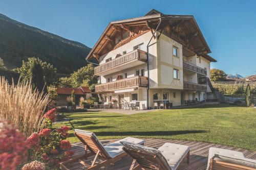 Niedermaierhof - carbon neutral hotel in Laces
