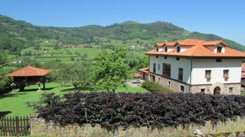 Hotel Rural Casa de la Veiga - carbon neutral hotel in Grado