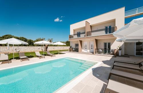 Eleia Domos Althea Homes — 4-Star Luxury Hotel in Monopoli, Italy