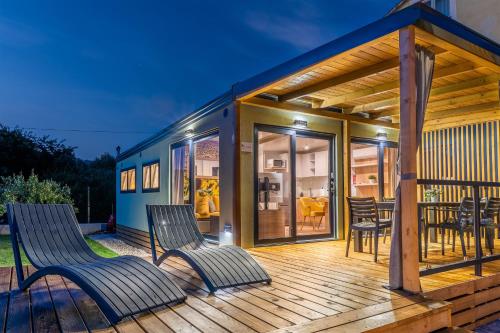 Giardino Sukošan new mobile houses in olive garden EV plug in station in Sukosan, Croatia