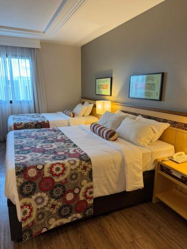 Alto Padrão Cama Queen e Viuvão no Hotel Let’s Idea in Unknown City, Brasil