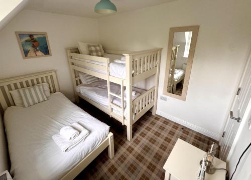 Gingerbread Cottage Part of the The Bay Filey Holiday Village with pool gym and direct beach access pub restaurant tennis and meadows walks