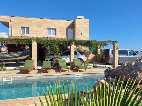 Apartments with swimming pool Bogdanovici Sibenik 23394 — 4-Star Luxury Hotel in Sibenik, Croatia