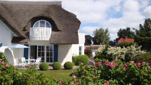 App 12 Holzerland — 4-Star Luxury Hotel in Born, Germany