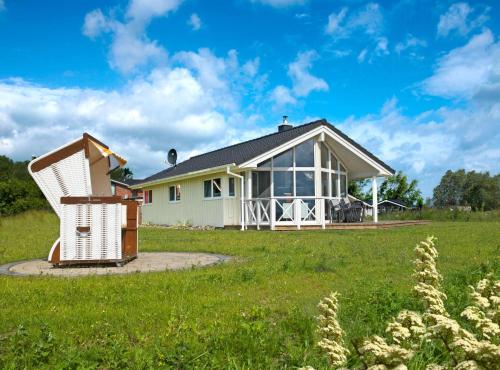 Dänische Ferienhäuser am Salzhaff Haus Käpt n Nemo — 4-Star Luxury Hotel in Kirchdorf, Germany