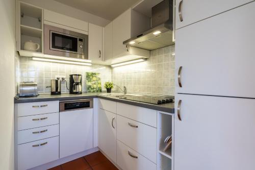 Feriendorf Rugana Komfort Appartement mit 1 Schlafzimmer B08 — 4-Star Luxury Hotel in Dranske, Germany