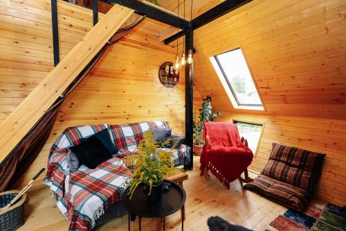 Wooden cottage green house in Bakuriani