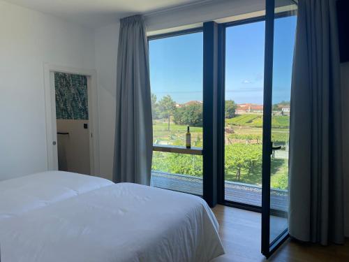 Habitación deluxe rodeada de viñedos — hotel in Ribadumia