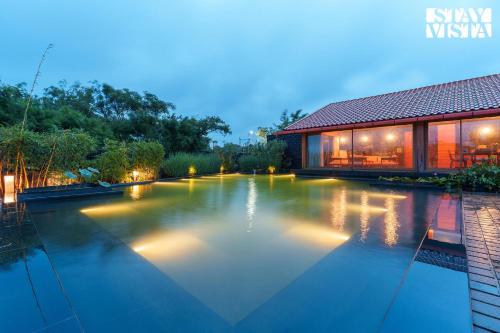 Bellevue Palace by StayVista Lavish abode with a pool Landscaped lawn Gazebo & Adventure activities in Nashik, India