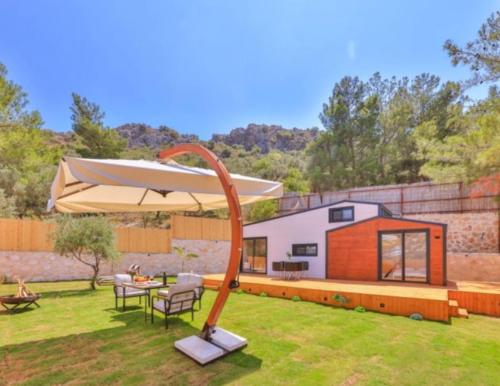 Tineville - carbon neutral hotel in Kas