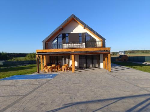 Domki na Kolonii Trzy domki nowe sala bankietowa 82m2 — hotel in Rybno