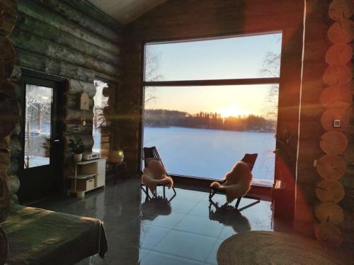 Upea kelohirsihuvila rannalla myös poreamme in Joensuu, Finland