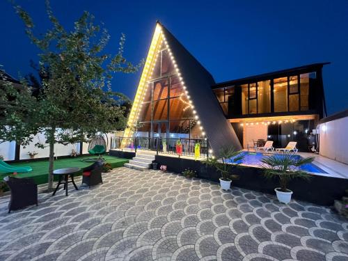 Viva hotel Gabala with outdoor pool Sauna and Waterfall in Qutqashen, Azerbaijan