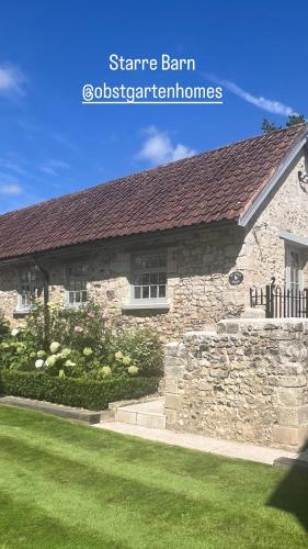 Starre Barn - carbon neutral hotel in Unknown City