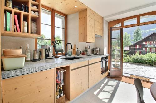 Chalet Eden Duplex Piano Garden Swedish Stove — Champery — photo 5