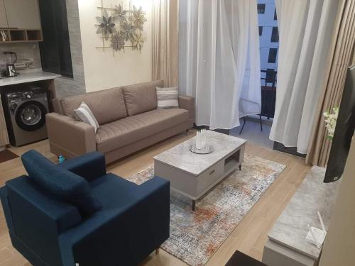 Executive classy apartment with executive finishes and luxurious modern facilities and which features a relaxing chill rooftop with breathtaking views