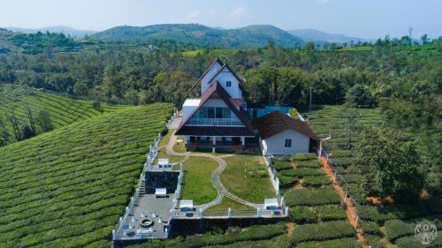 The Highlander - carbon neutral hotel in Erattupetta