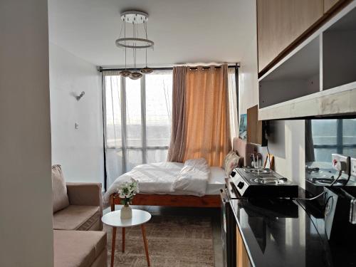 Fedha A modern furnished Studio Apartment near JKIA and SGR free WIFI Parking