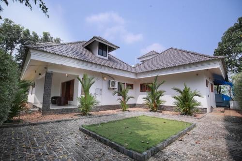 Hill House Waves and Shores — 4-Star Luxury Hotel in Kottayam, India