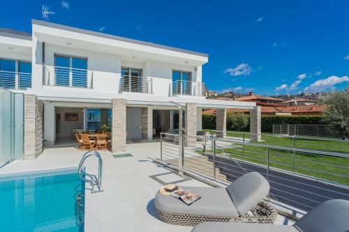 New Villa Vogue — 4-Star Luxury Hotel in Tremezzo, Italy