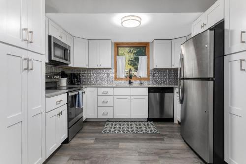 Private Hot Tub Overlooking Gore Creek Parking for 4 Updated Townhome in Vail, United States