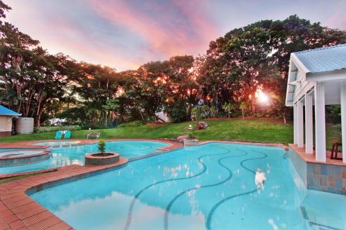 Caribbean Estates Holiday Resort - carbon neutral hotel in Unknown City