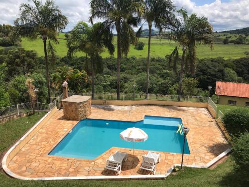 Chácara das Palmeiras Piscina Churrasqueira e Campo - carbon neutral hotel in Unknown City