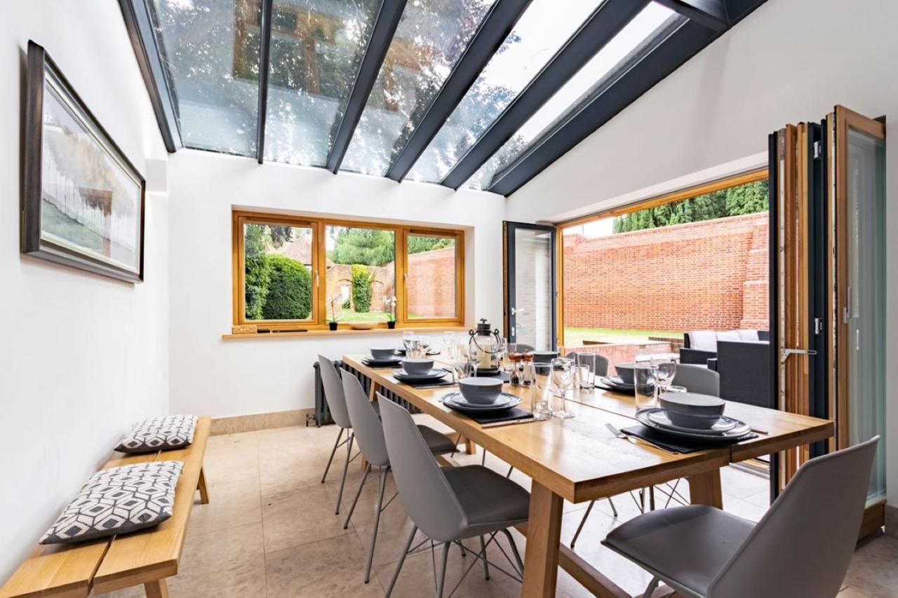 SandiComplex 2 properties joined by a garden gate in Sandwich, United Kingdom