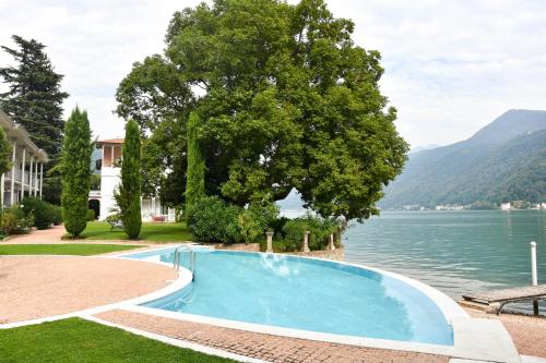 Beautiful Apartment on the Lake Pool & Parking Nr 124 — 4-Star Luxury Hotel in Porto Ceresio, Italy