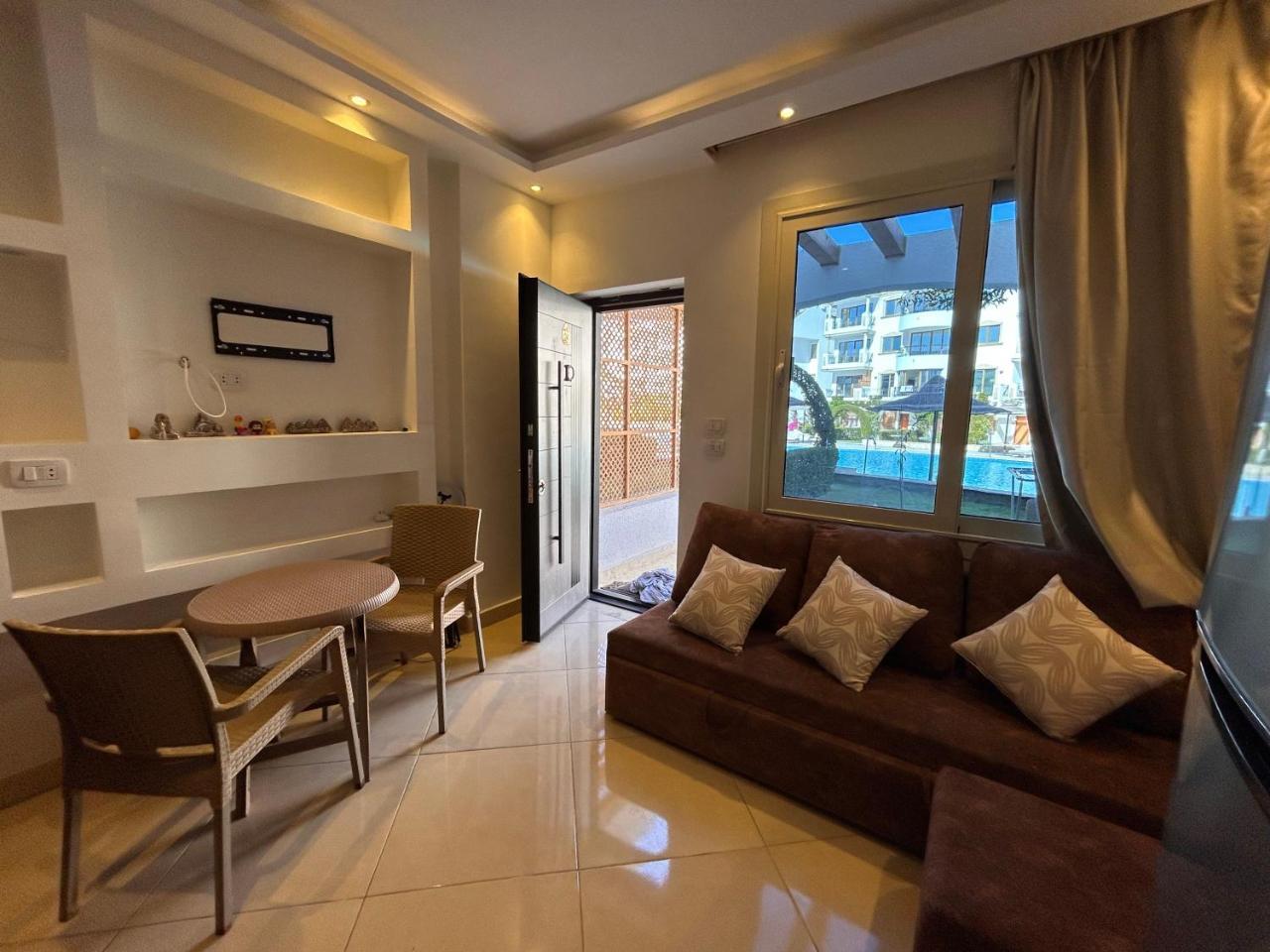 Cosy Studio on the First Floor with lovely Terrace and Personal Garden Area Pool View and Free Beach Access in Sharm Hills Resort in Sharm El-Sheikh, Egypt