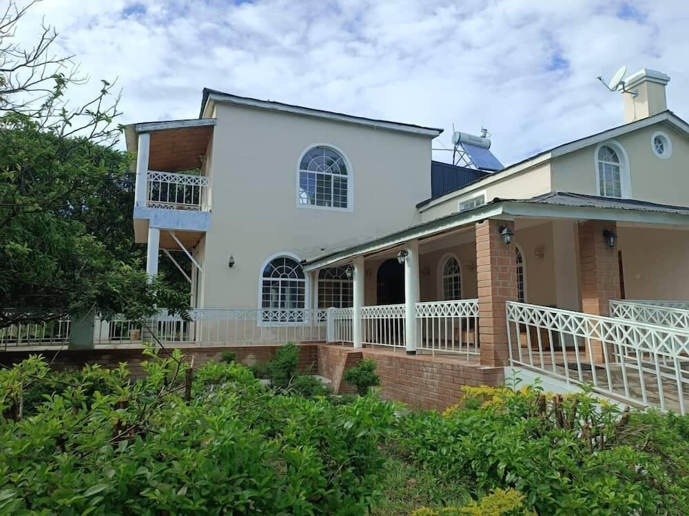 Captains Villa where Lake Malawi and Shire River meet historical hotel at waterfront next to the Lake Museum in Mangochi Town in Mangochi, Malawi