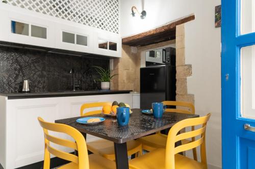 GuestHost Aretusa Suite Ortigia Historic Gem — 4-Star Luxury Hotel in Siracusa, Italy