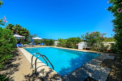 Villa Can Joan den Coves — 4-Star Luxury Hotel in Santa Eularia Des Riu, Spain