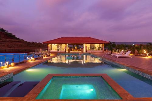 La Palm by StayVista Mountain view villa boasting a spacious pool Gym Indoor games Basketball court & A lush lawn with a gazebo — 5-Star Luxury Hotel in Lonavla, India
