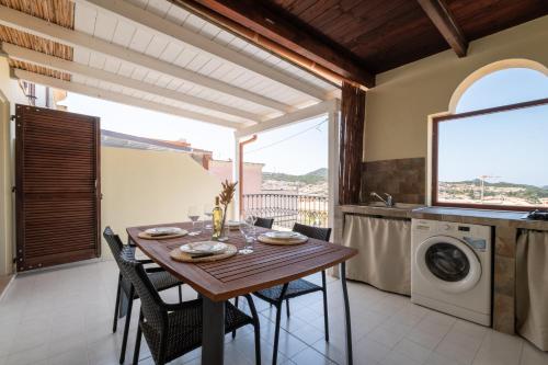 Panoramic view Moderno con terrazza e Wi Fi — 4-Star Luxury Hotel in Villasimius, Italy