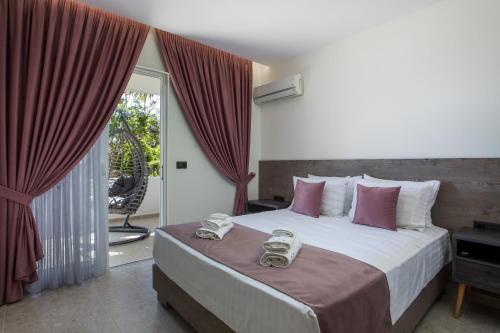 Matsi Suites — 4-Star Luxury Hotel in Faliraki, Greece