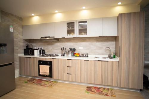 Serenity Suites Apartment With Private Parking Space Modern Equipped Gym Swimming Pool And A Relaxing Rooftop With Unbeatable City Views