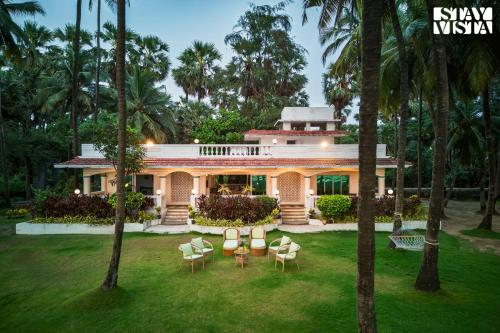 StayVista's Villa Bharat Beachfront serenity with A spacious lawn