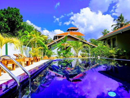 Thambili cabanas - last minute hotel in Hikkaduwa