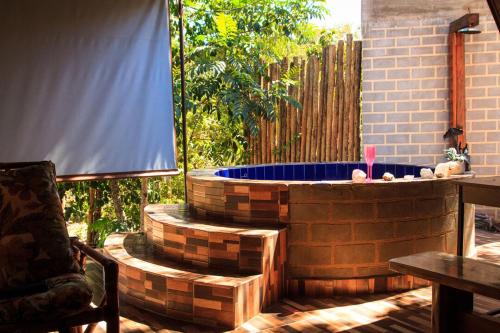 Chalé com churrasqueira e jacuzzi aquecida - carbon neutral hotel in Unknown City