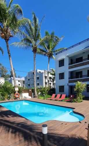 Les Cerisiers Exclusive Beach Residence 3 Bedroom Modern Apartment Flic en Flac — 4-Star Luxury Hotel in Flic En Flac, Mauritius