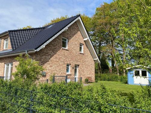 Huus luettje Finja — 4-Star Luxury Hotel in Hage, Germany