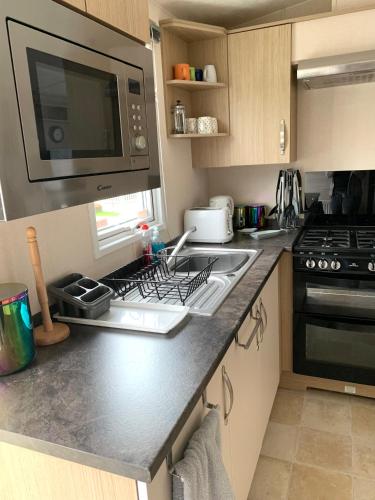 Mollys Retreat pet friendly three bed caravan with small garden Newquay Bay Resort Quieter area of park in Newquay, United Kingdom