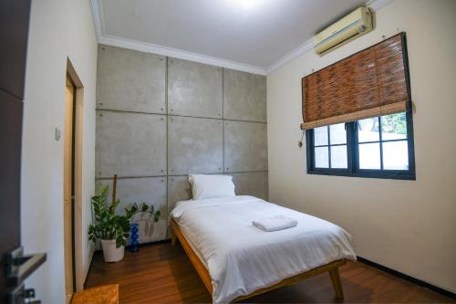 Dhome by Riana - carbon neutral hotel in Malang