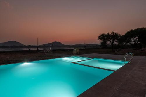 1br Cottage with Pool Lake Escape by Roamhome — 4-Star Luxury Hotel in Udaipur, India