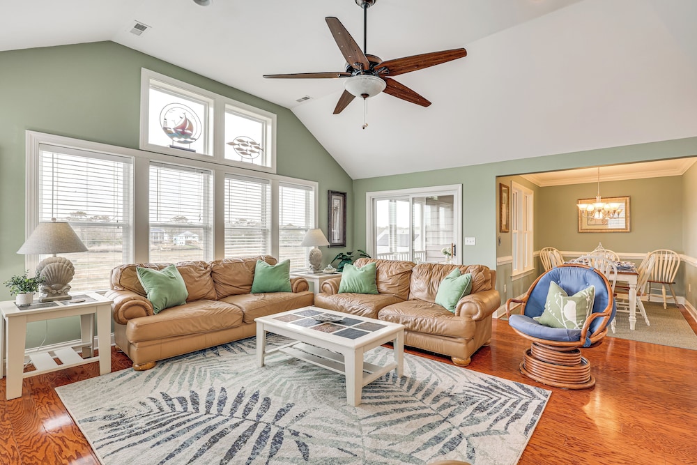 Steps to Beach: Gem w Views & Dock in Oak Island in Oak Island, United States