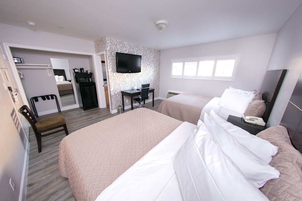 Metropolitan Inn & Suites - photo 19