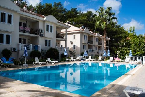 Stylish 2BR Apartment in Ölüdeniz by the Forest with Pool — 4-Star Luxury Hotel in Fethiye, Turkey